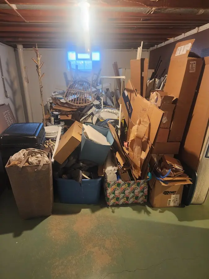 Roll-off dumpster container at job site for 2 Yard Dumpster Rental in Upper Chichester